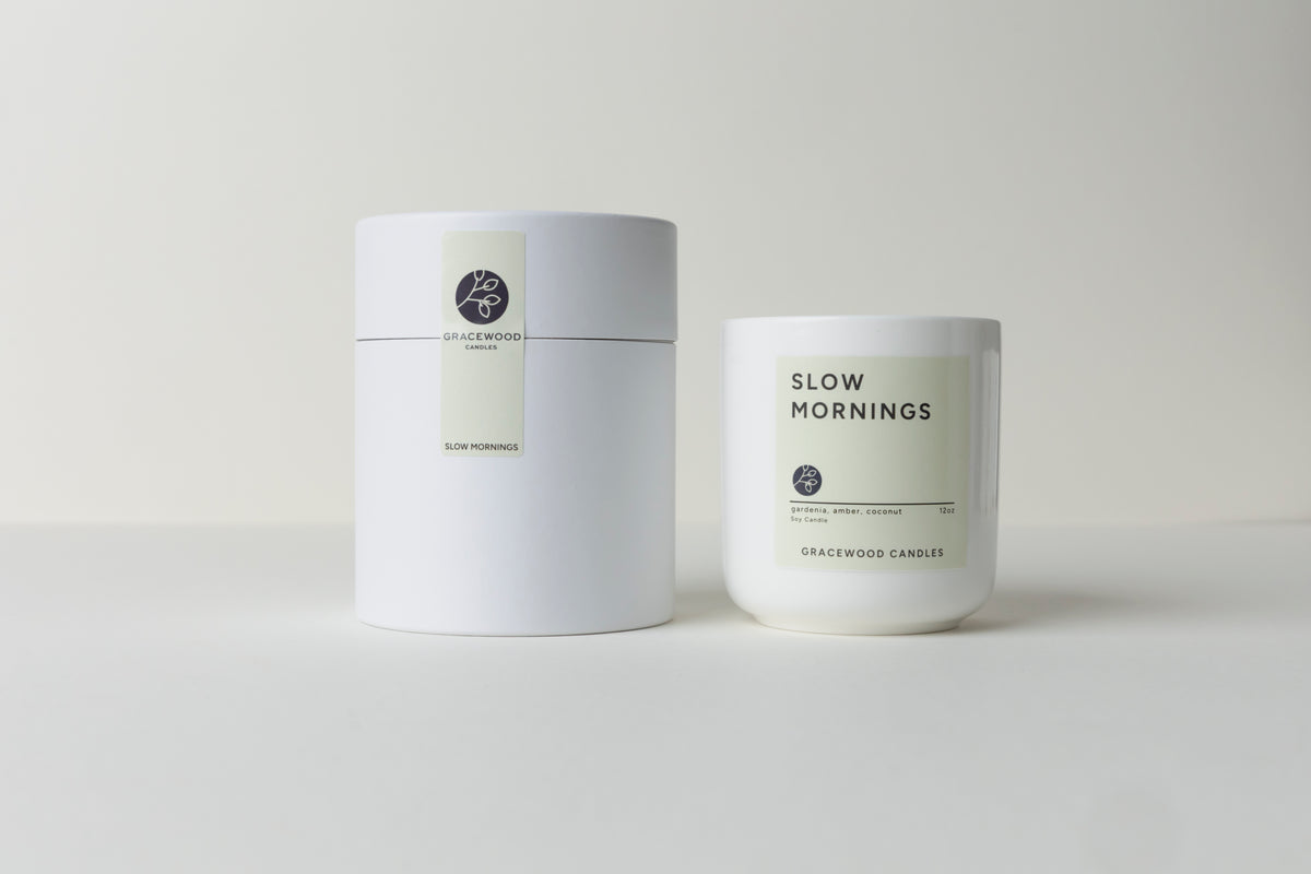 Two candles with labels on a white background
