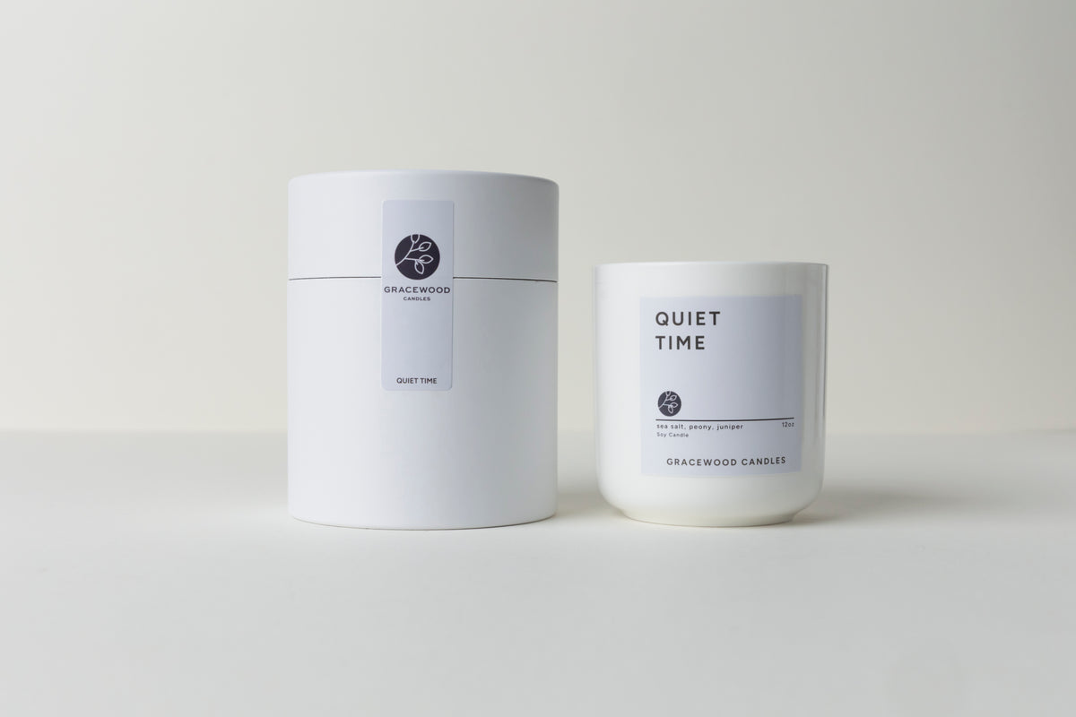 Two candles labeled 'Quiet Time' by Gracewood candles on a white background