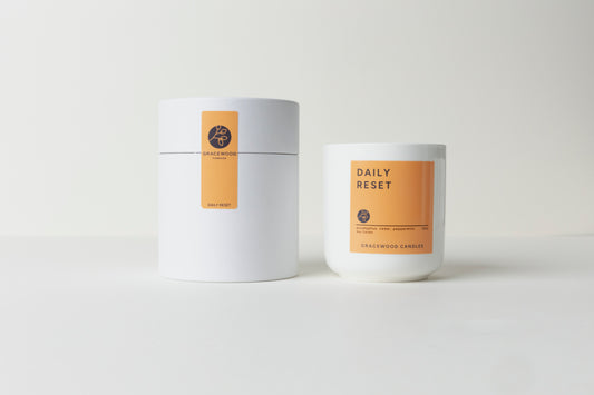 Two candles with labels on a white background